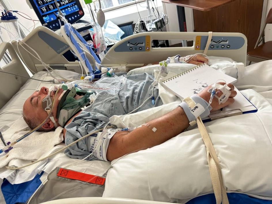 A man in a hospital bed