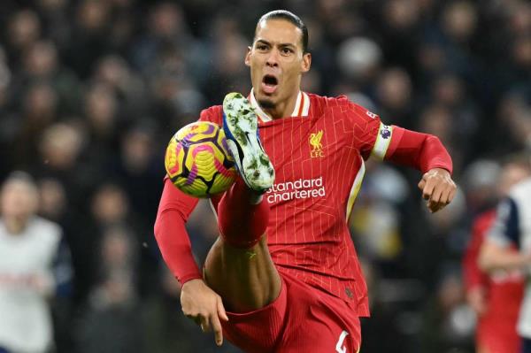 Liverpool's Dutch defender #04 Virgil van Dijk controls the ball during the English Premier League football match between Tottenham Hotspur and Liverpool at the Tottenham Hotspur Stadium in London, on December 22, 2024. - AFP photo